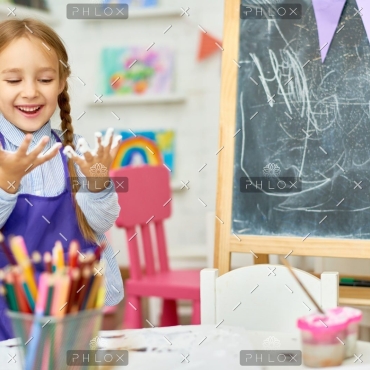 demo-attachment-1016-cute-girl-playing-with-paint-in-art-class-85QTUD9-e1589448274786